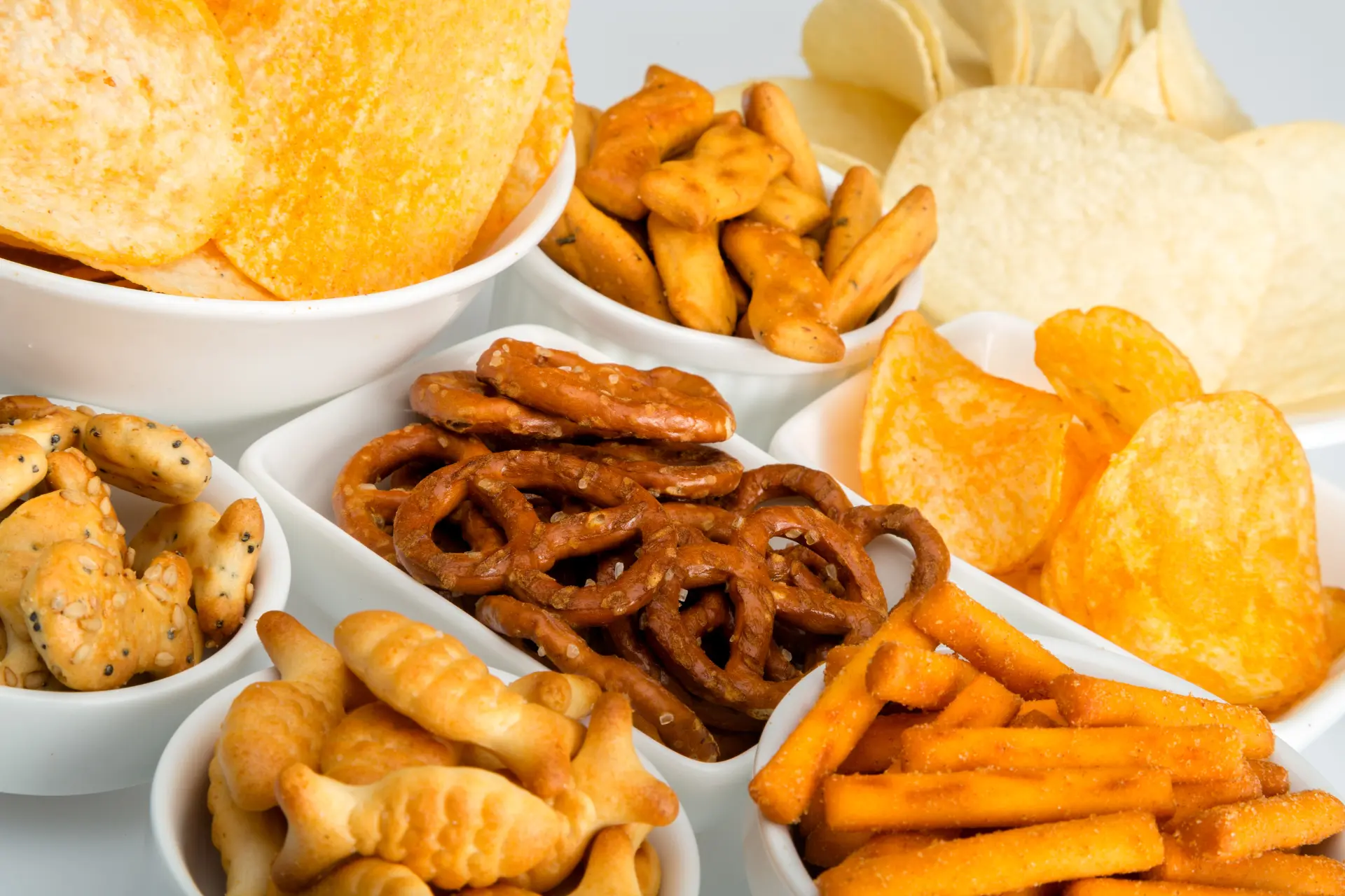 Poolside snacks and drinks bundle with chips, pretzels, and crackers for Anna Maria Island rentals.